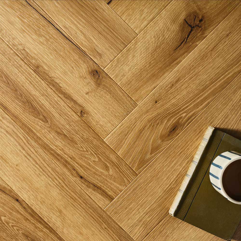 Textures LVT Honey Oak TH07 Herringbone Flooring - Premier Carpets & Flooring Ltd